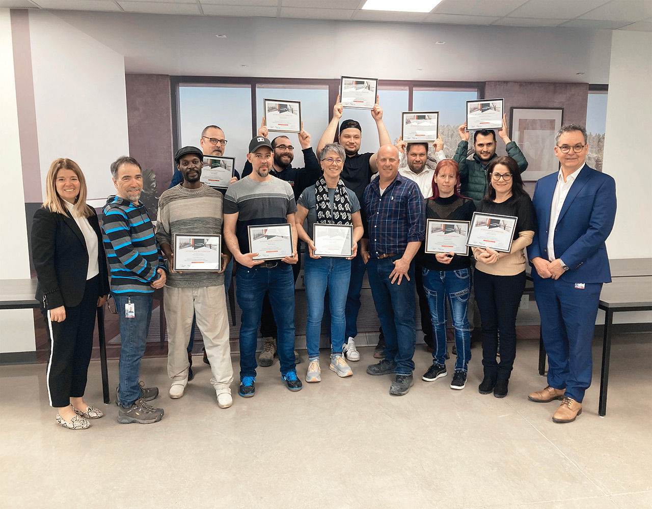 A third cohort of Novatech Group employees receive their vocational diplomas